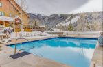 Shared pool and hot tubs at Dakota Lodge in winter